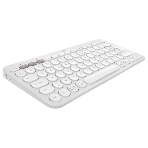 Clavier sans fil Logitech Pebble Keys 2 K380s blanc, avec une disposition AZERTY, dans un environnement de bureau moderne avec un ordinateur portable et un smartphone.