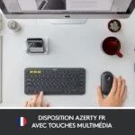 Clavier sans fil Logitech K380 en usage avec tablette et smartphone.