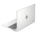 HP Pavilion Plus 16 laptop showing QWERTY backlit keyboard and sleek modern design.